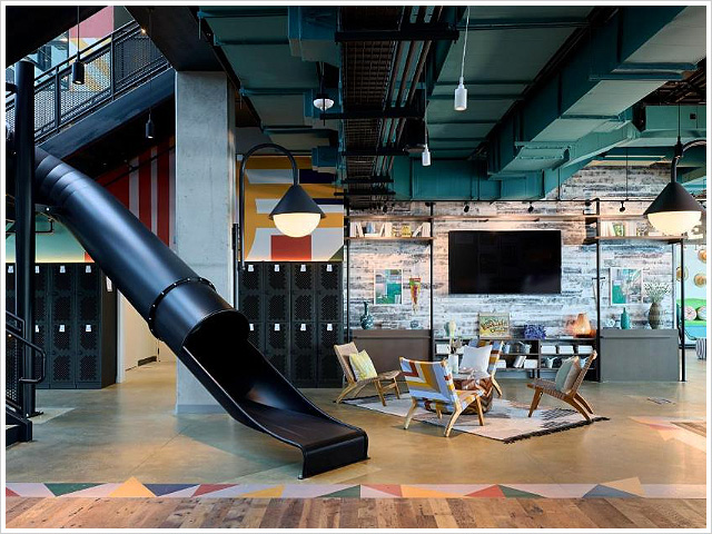 The Moxy Virginia Beach Oceanfront two-story slide to lobby 